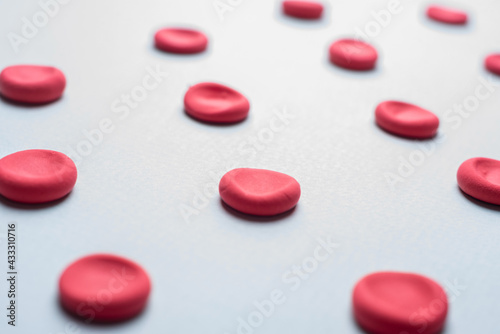 medical flatlay erythrocytes on a blue background.