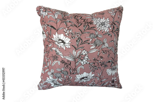 Decorative pillow with a floral pattern.