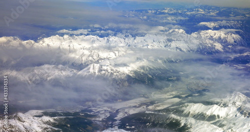 Flying over the snowy mountains