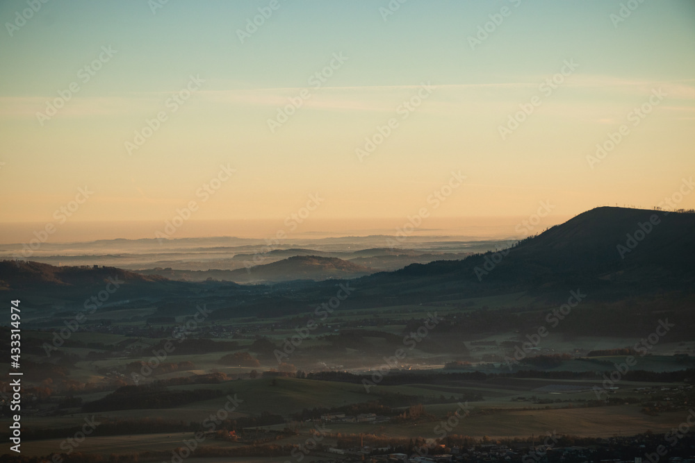 Fototapeta premium Awakening of summer Czech nature around Ondrejnik mountain in Beskydy mountains. Morning sun falls on the landscape
