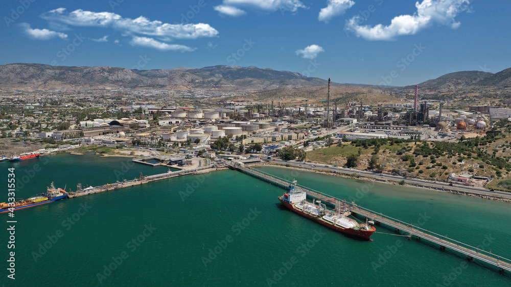 Aerial drone photo of industrial public Hellenic Petroleum refinery in area and bay of Aspropirgos, Attica, Greece