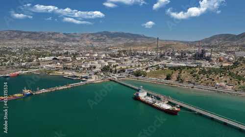 Aerial drone photo of industrial public Hellenic Petroleum refinery in area and bay of Aspropirgos, Attica, Greece