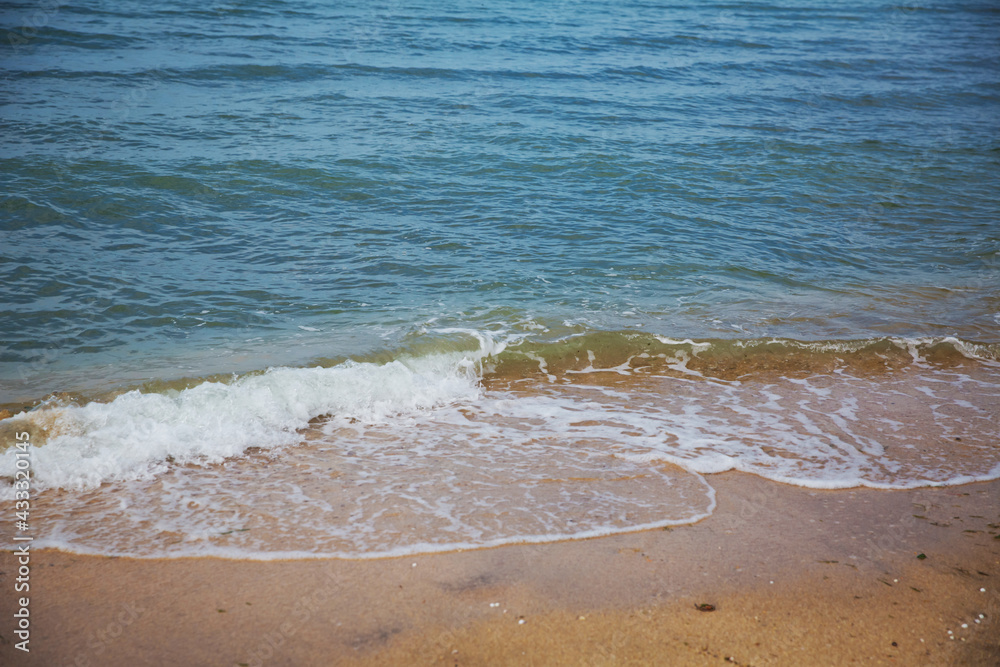Clean and relaxing sea wave splashes over seashore. Idyllic seascape for beach wedding or honeymoon. Exotic seaside banner . Caspian Sea sea water over white sand beach. Clean and relaxing sea wave splashes over seashore. Idyllic seascape for beach wedding or honeymoon. Exotic seaside banner . Caspian Sea sea water over white sand beach.