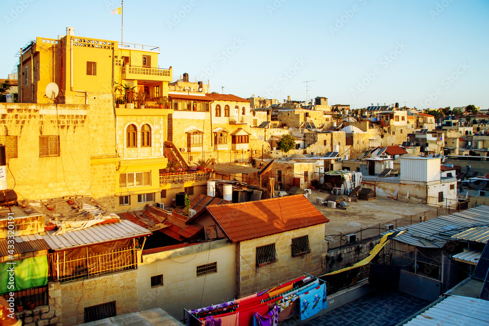 sunrise and rooftops of old town of Jerusalem