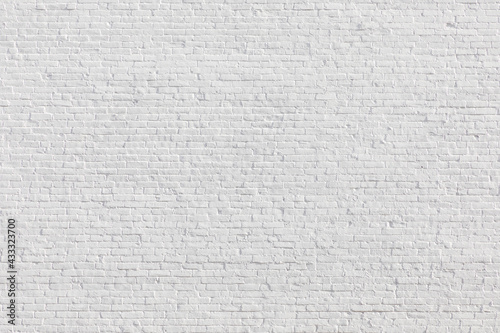 old brick wall painted in white