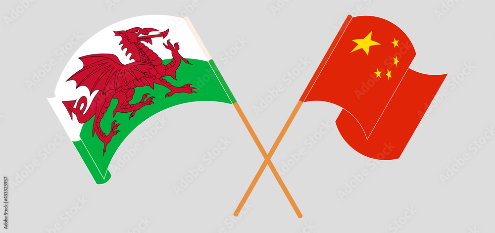 Crossed and waving flags of Wales and China Crossed and waving flags of Wales and China