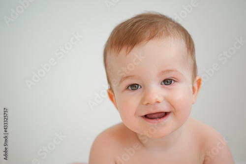 Portrait of a kid on a white background selective focus
