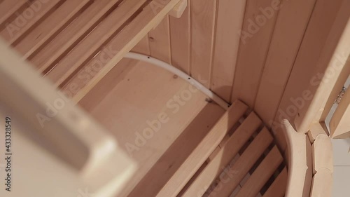 Cedar phytobarrel with wooden grates for feet and sitting and door with hinges