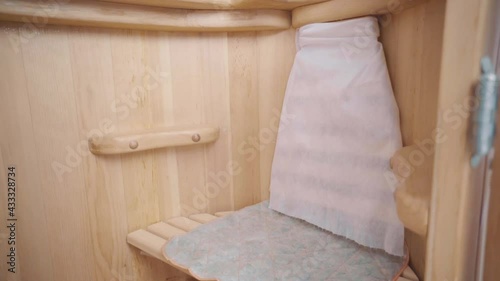 Closeup of cedar phyto barrel with locks on latches grates and handstands inside