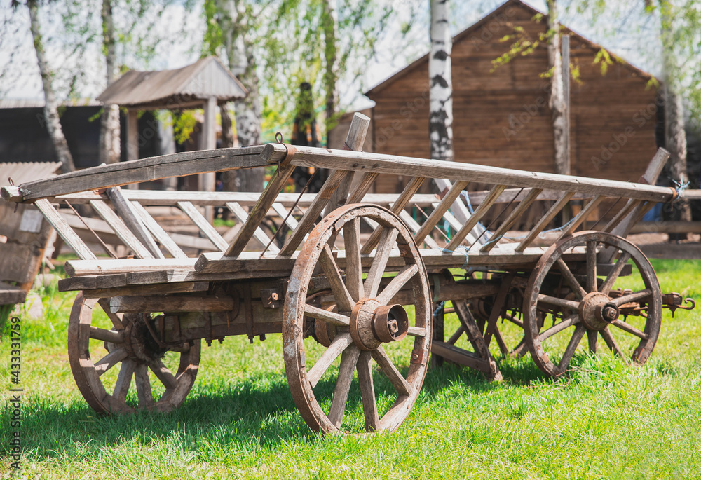 Old worn out wooden cart in the village