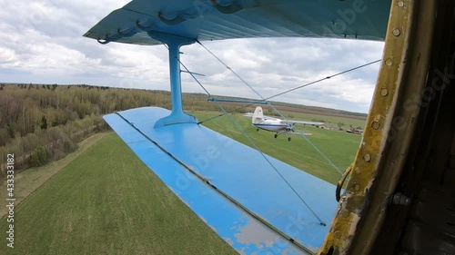 Aviation. The view from the opened door of a flying airplane.