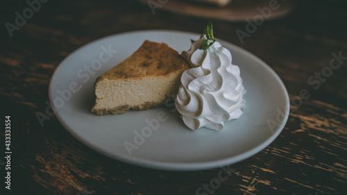 Cheese cake with cream photo