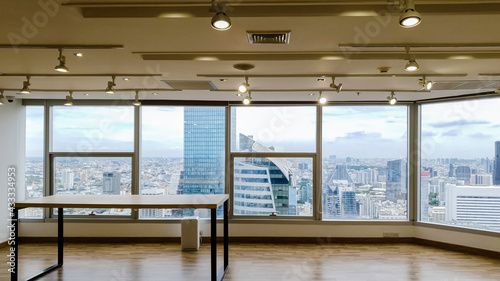 Office building window interior deign with modern city skyline background, Beautiful real estate building and skyscrapers in Bangkok Thailand