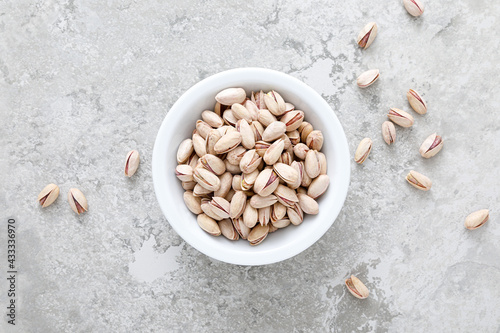 Pistachious in a bowl, top view photo