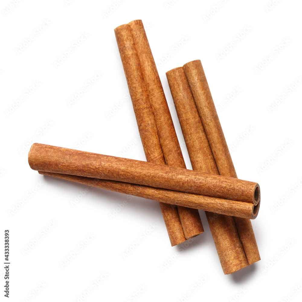 Delicious cinnamon sticks, isolated on white background