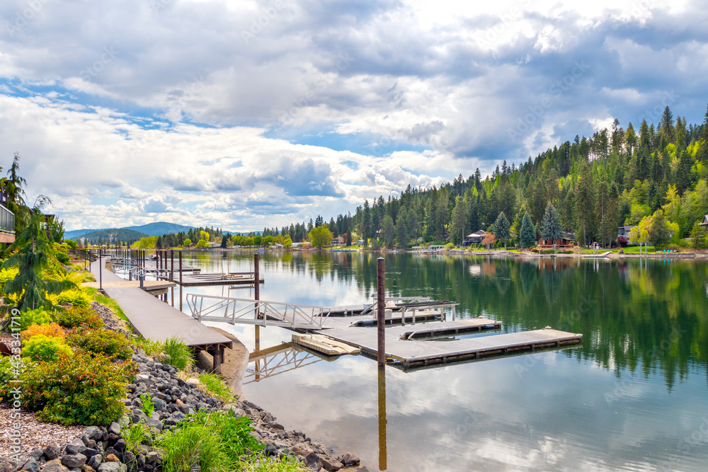 Shared boat slips and docks along a waterfront townhome complex on