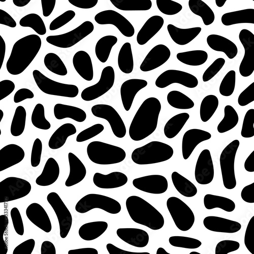 Seamless abstract pattern with black spots. Simple vector texture - white background with black spots. Spotted background, wallpaper, fabric, textile, for wrapping paper, dalmatian print, cow pattern.