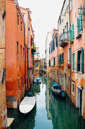 Gondola in canal of Venice, Italy.
