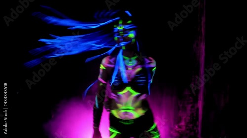 Disco dancer in neon light.