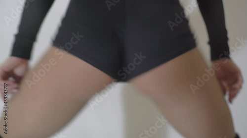 4K Closeup picture of female back silhouette with hands on perfect sexy buttocks