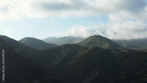 Mt Daisen, Clouds over Mountain in Early Morning, Establishing Pan Shot photo