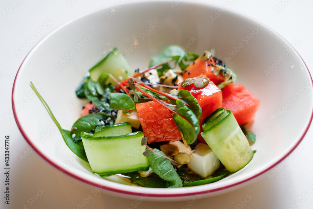 Salad with watermelon and cucumber.