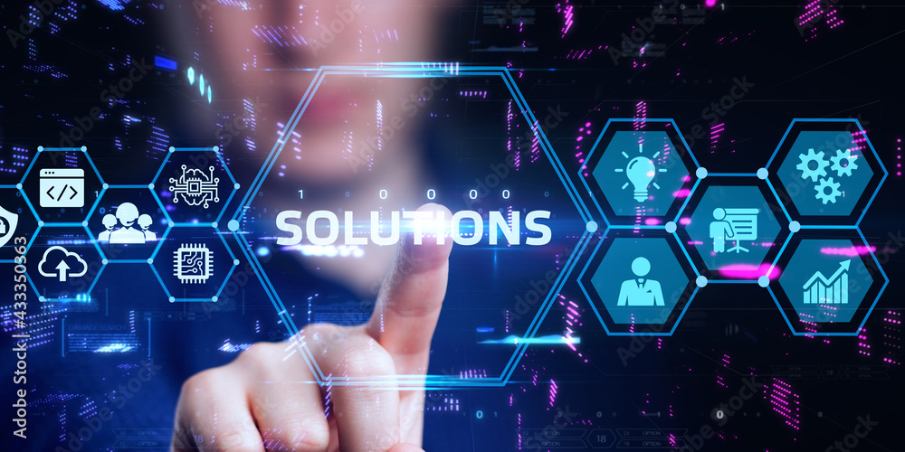 Business, Technology, Internet and network concept. Young businessman working on a virtual screen of the future and sees the inscription: Solutions