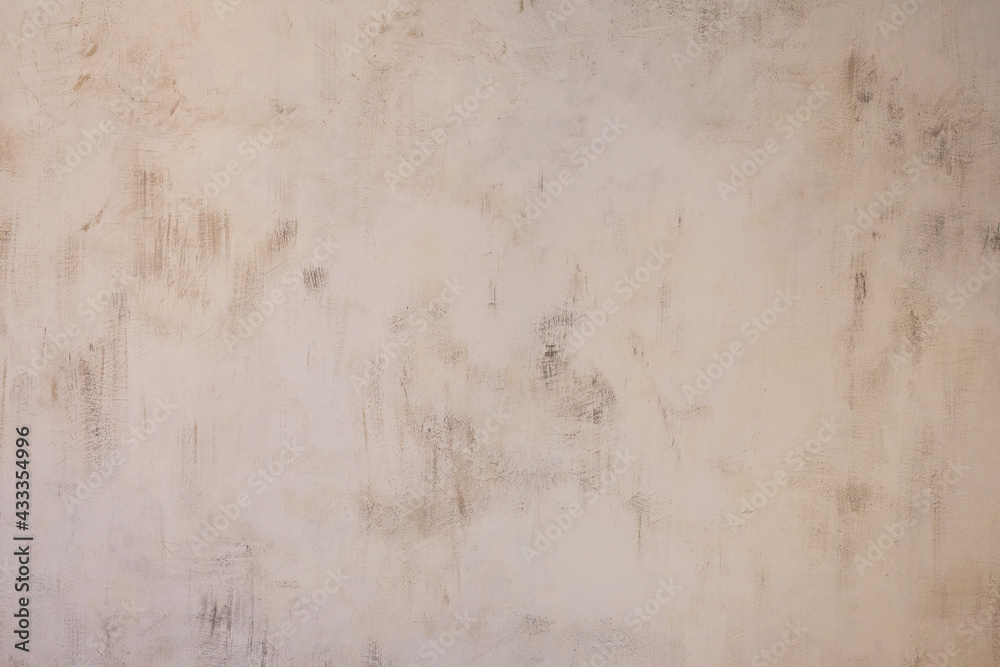 Concrete background. Textured gray wall with scratches and stains.