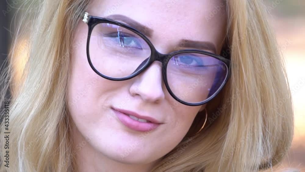 Young beautiful woman with glasses in autumn park. Young beautiful woman with glasses in autumn park.