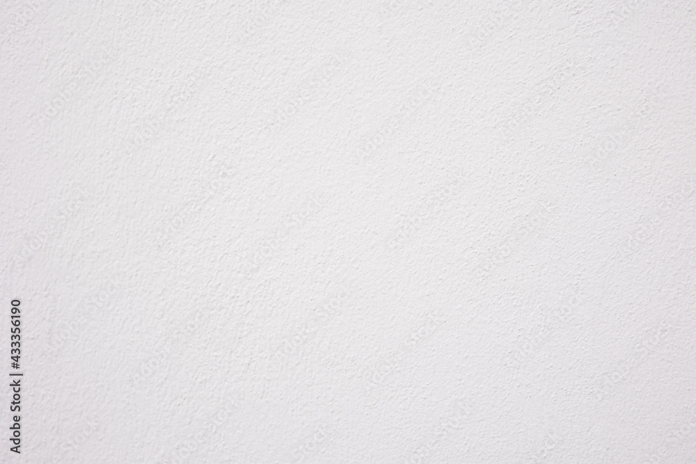 Close up and lay flat shot of concrete wall with white color painting shows texture and rough surface of material with bright and clean background. It is beautiful for blank background template. Close up and lay flat shot of concrete wall with white color painting shows texture and rough surface of material with bright and clean background. It is beautiful for blank background template.