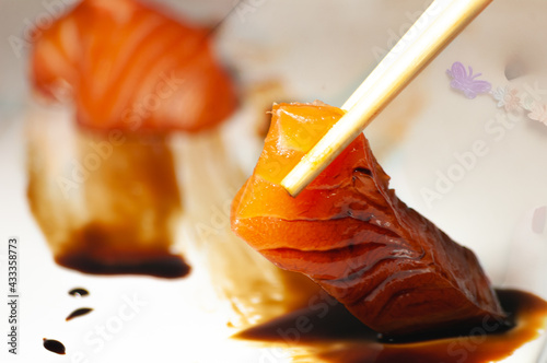 Salmon sashimi with teriyaki sauce