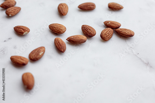 Almonds and white marble tray