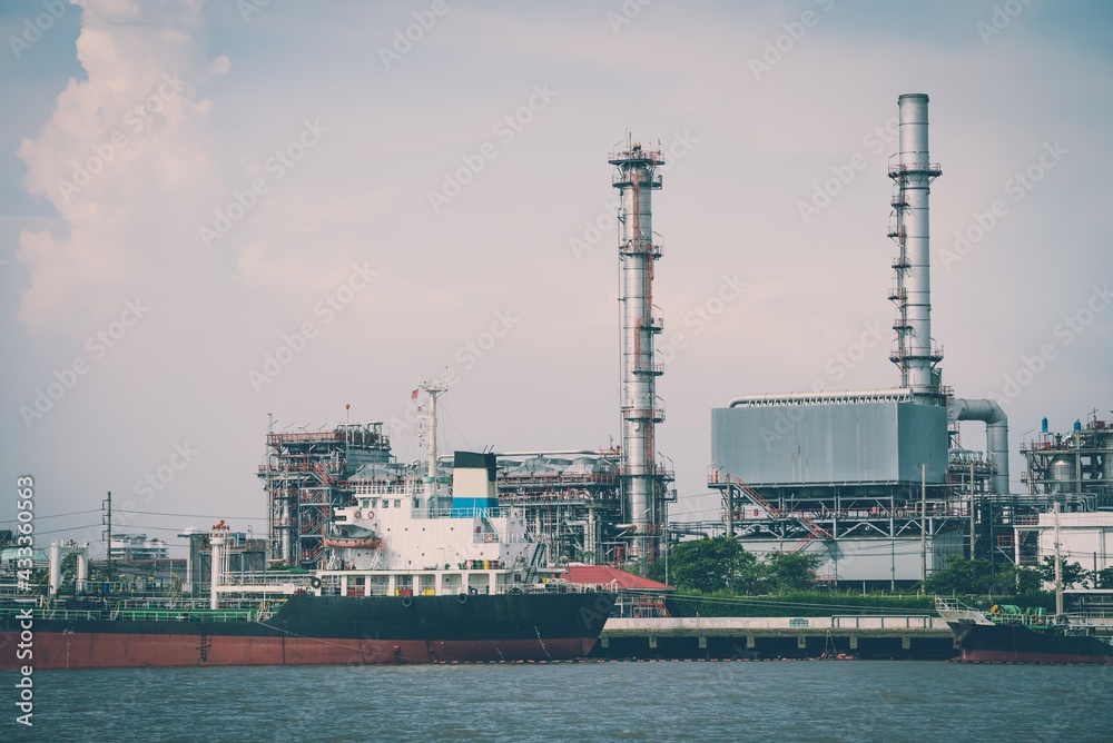 Oil refinery plant factory in industry economic zone. Petrochemical, petroleum, power energy and engineering concept Oil refinery plant factory in industry economic zone. Petrochemical, petroleum, power energy and engineering concept