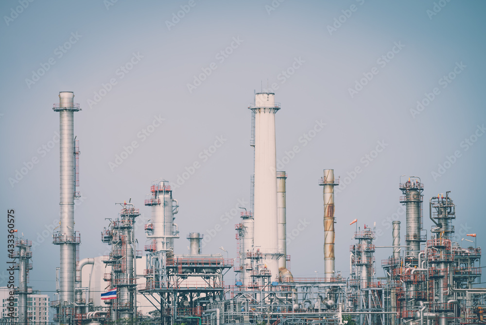 Oil refinery plant factory in industry economic zone. Petrochemical, petroleum, power energy and engineering concept. Oil refinery plant factory in industry economic zone. Petrochemical, petroleum, power energy and engineering concept.
