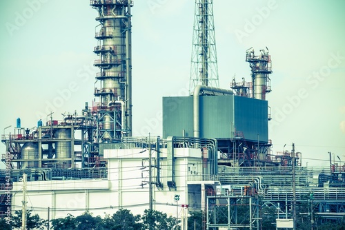 Oil refinery plant factory in industry economic zone. Petrochemical, petroleum, power energy and engineering concept
