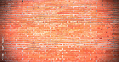 The background of the brick wall with dark orange is beautifully arranged. Ancient wall Grunge background The backdrop may be used in interior design.