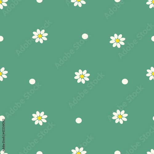 cute seamless pattern with chamomile flowers and dots on a green background. summer pattern for printing on fabric, clothing, wrapping paper