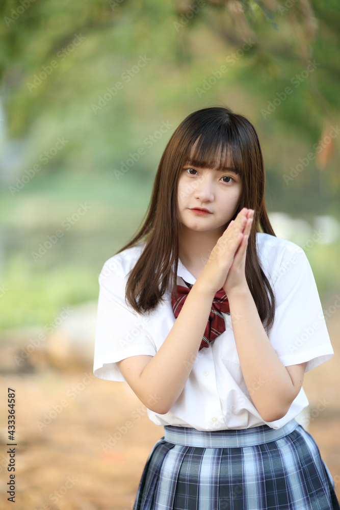 Fototapeta premium beautiful asian japanese school girl uniform looking at park outdoor