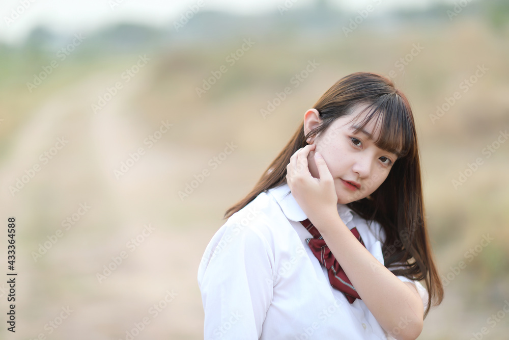 beautiful asian japanese school girl uniform looking at park outdoor beautiful asian japanese school girl uniform looking at park outdoor