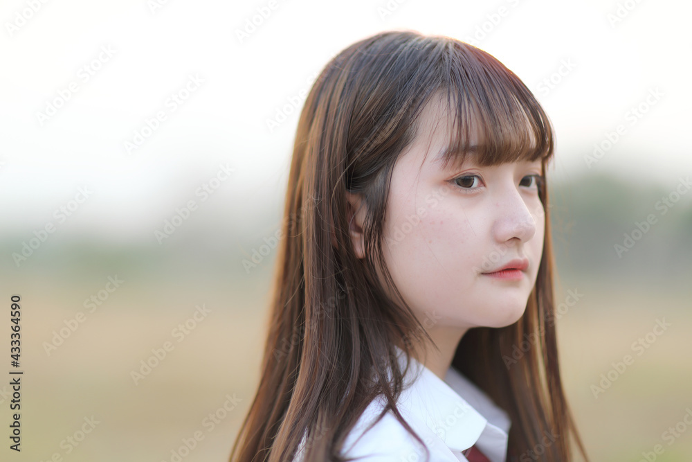 beautiful asian japanese school girl uniform looking at park outdoor beautiful asian japanese school girl uniform looking at park outdoor