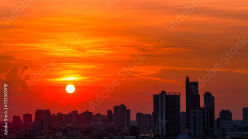 The high angle background of the city view with the secret light of the evening  blurring of night lights  showing the distribution of condominiums  dense homes in the capital community