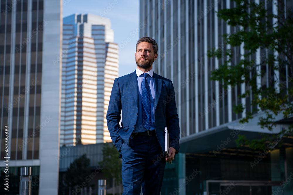 Businessman with success business. Outdoors portrait male model in suit. Businessman walking. Businessman with success business. Outdoors portrait male model in suit. Businessman walking.