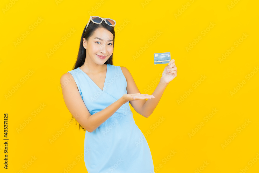 Portrait beautiful young asian woman smile with credit card Portrait beautiful young asian woman smile with credit card