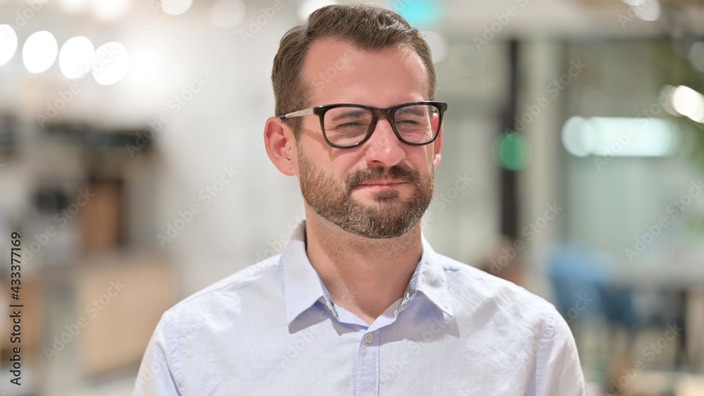 Portrait of Focused Businessman saying No by Head Shake Portrait of Focused Businessman saying No by Head Shake
