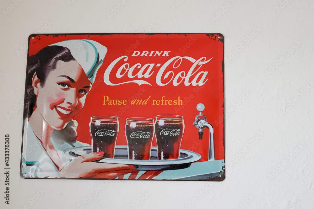 Coca Cola pinup vintage plate advertisement sign logo and brand text coffee  store cafe carbonated soft drink produced refreshment Stock-Foto | Adobe  Stock