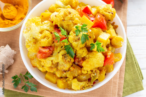 Curry roasted cauliflower - vegetarian vegetable dish, selective focus