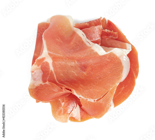 sliced jamon isolated on white background