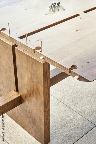 Assembling of wooden dining table with worktop connectors