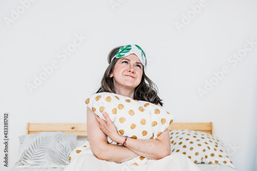 Girl in bed woke up, sleep, morning, morning procedures, Breakfast, pillow, sleep mask, hands