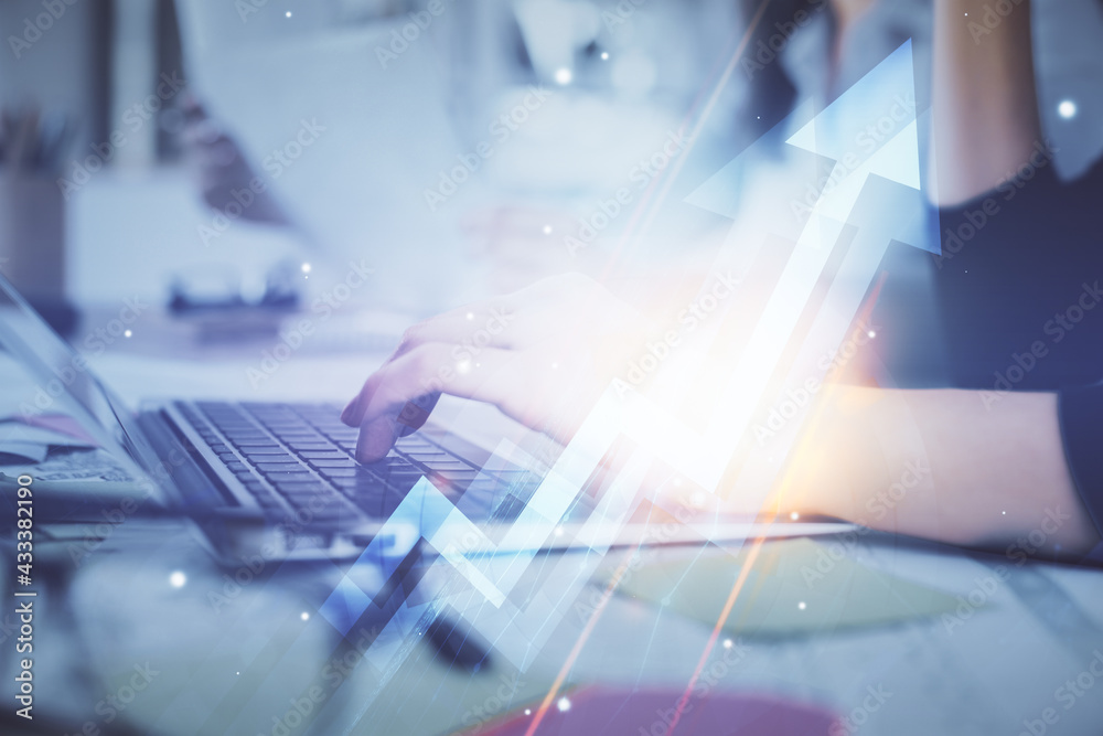 Double exposure of woman hands typing on computer and arrows drawing. Success concept. Double exposure of woman hands typing on computer and arrows drawing. Success concept.